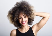 Beautiful smiling woman with curly hair